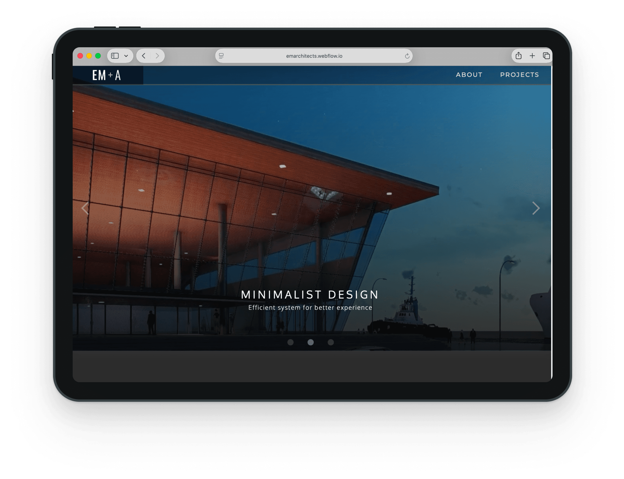 EM+Architects website on a tablet